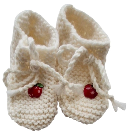 Hjemmestrikkede råhvid uld futter str. 80