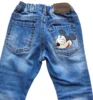 Next blå denim bukser og en stribet bluse str. 92