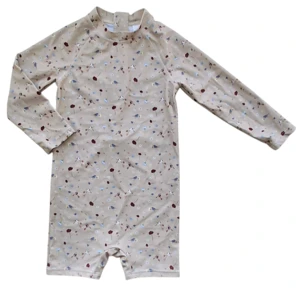 Ny Nuuroo beige langærmet UV heldragt str. 98-104